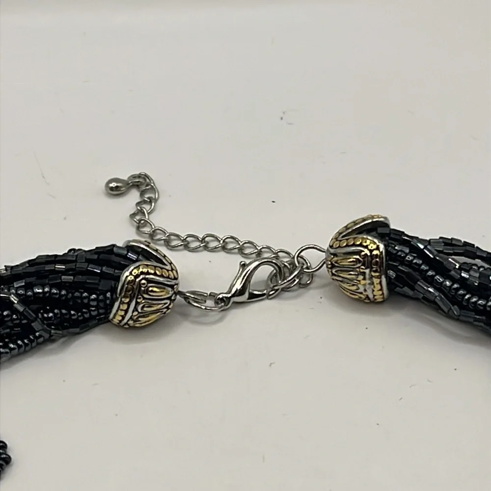 Elegant Black Beaded Necklace with Gold and Silver tone Pendant with Quartz